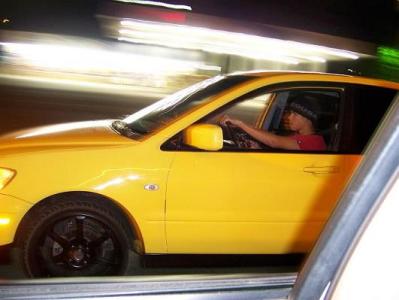 Chris riding through town